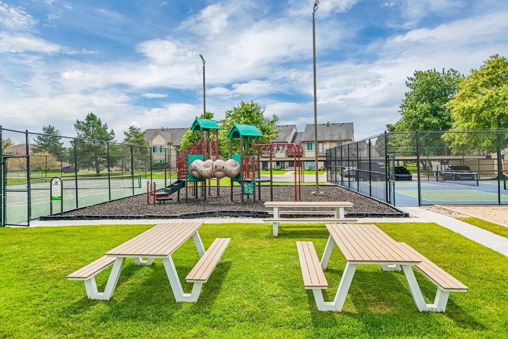Playground with picnic tables at Lakeside Terraces in Sterling Heights, Michigan