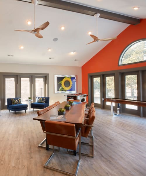 Resident lounge with shuffleboard at Lakeside Terraces in Sterling Heights, Michigan